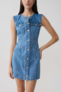 Woman wearing button front denim mini dress.